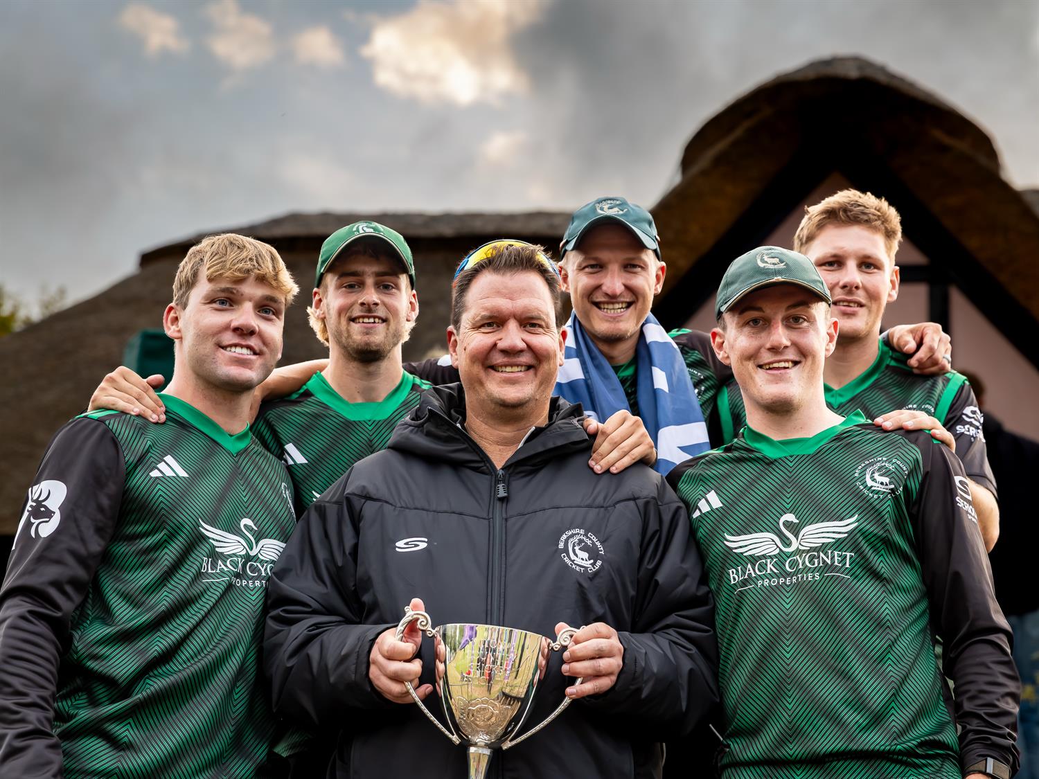 Berkshire's coach Bjorn Mordt with the NCCA Dojo T20 Trophy and some of the Berkshire squad following their victory over Bedfordshire in the final at Wormsley Cricket Ground on August 30th, 2026.