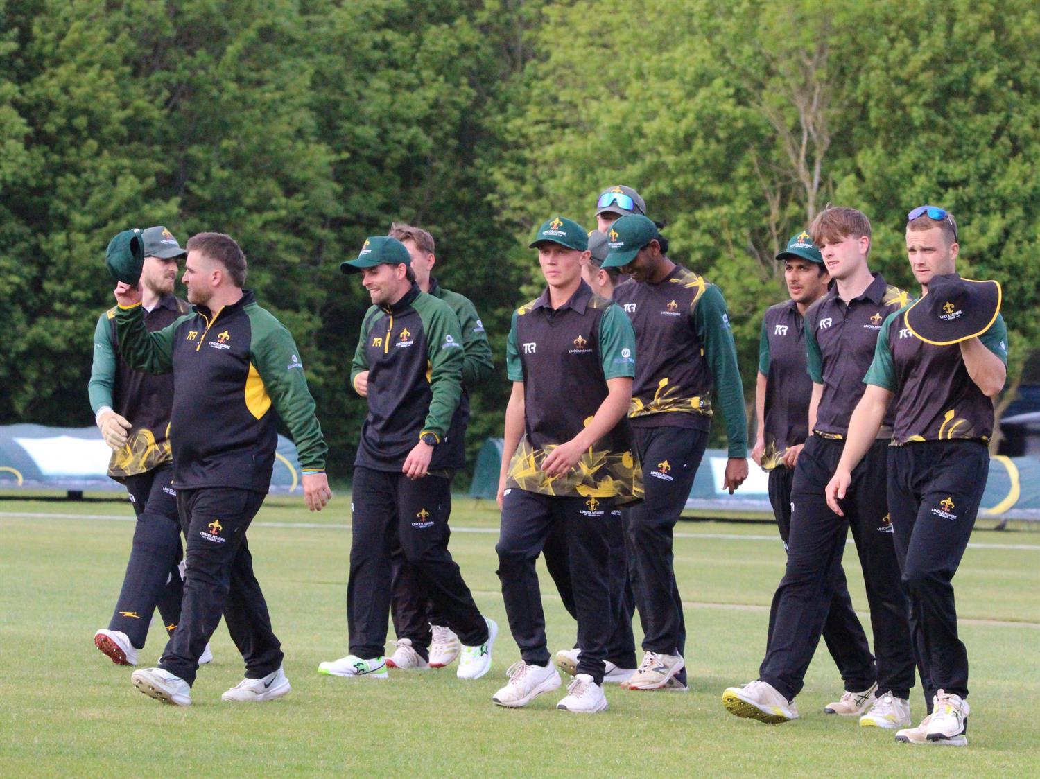 Bedfordshire v Lincolnshire, NCCA Trophy Group 2 match, held at Dunstable Town Cricket Club on 03/05/2026 .
Lincolnshire C.C.C. team leaving the field at close of play.