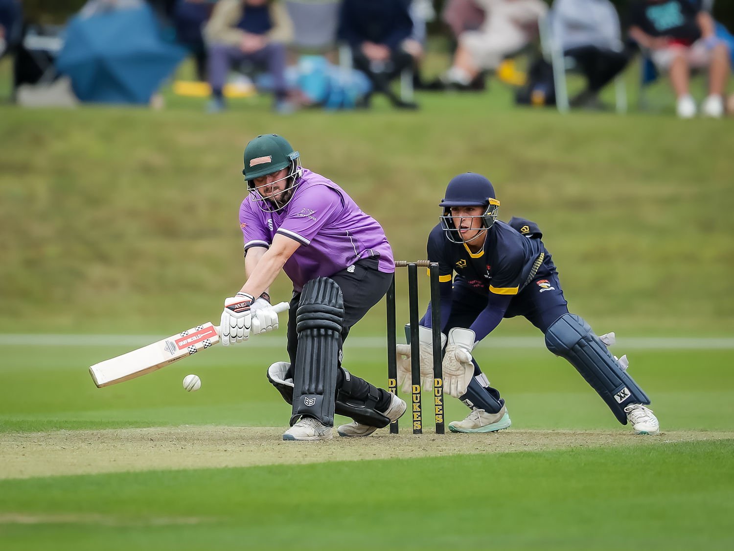 Harry Dearden batting for Cheshire as Charlie Hood keeps wicket for Norfolk in the NCCA Trophy Final at Wormsley Cricket Ground on August 25th, 2024.