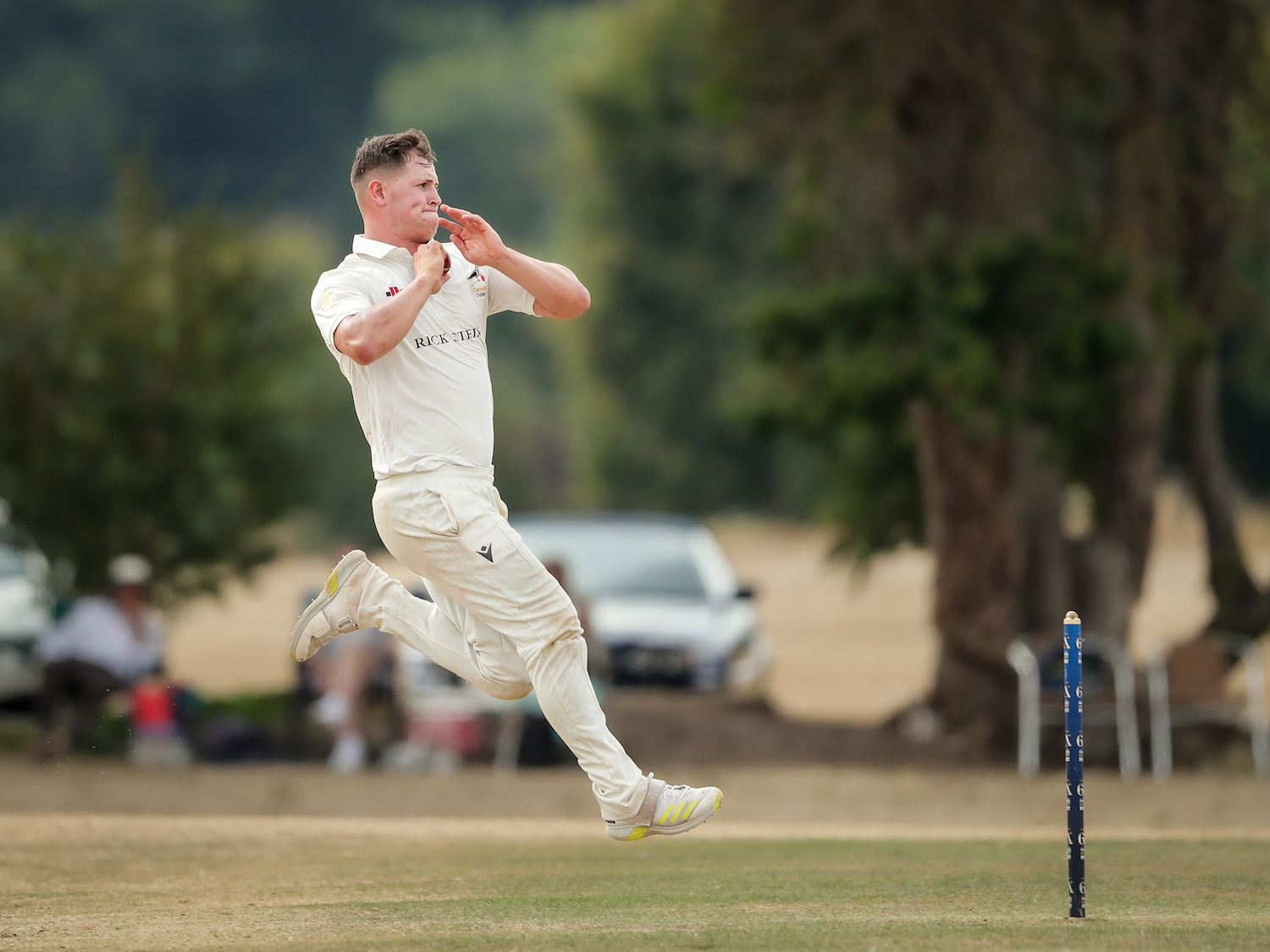Cornwall's Tom Dinnis runs in to bowl on the second day of the NCCA Championship match against Wiltshire played at South Wilts Cricket Club on August 15th, 2022.