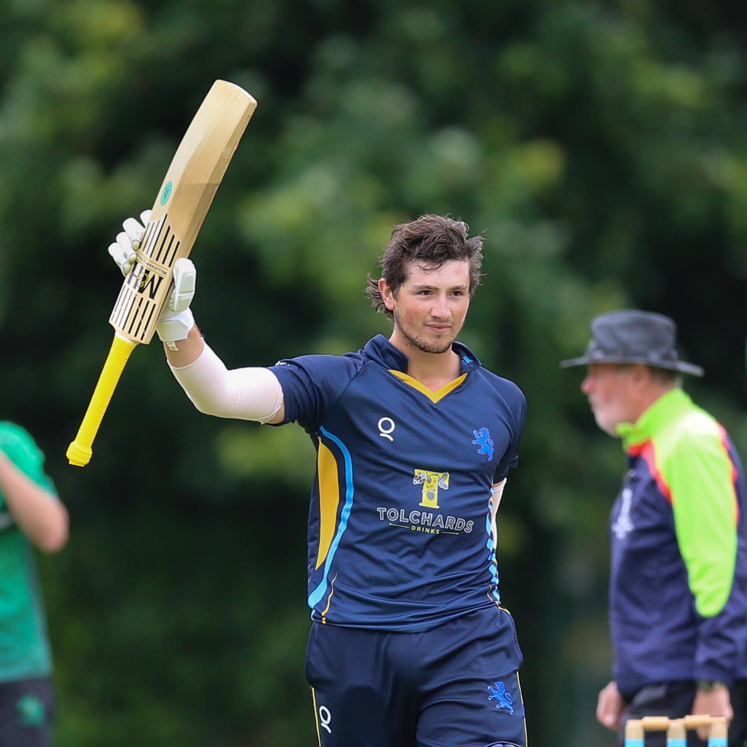 Ben Privett celebrates a century for Devon against Buckinghamshire in the NCCA Trophy Group 3 match held at High Wycombe Cricket Club on 09/06/2024 .