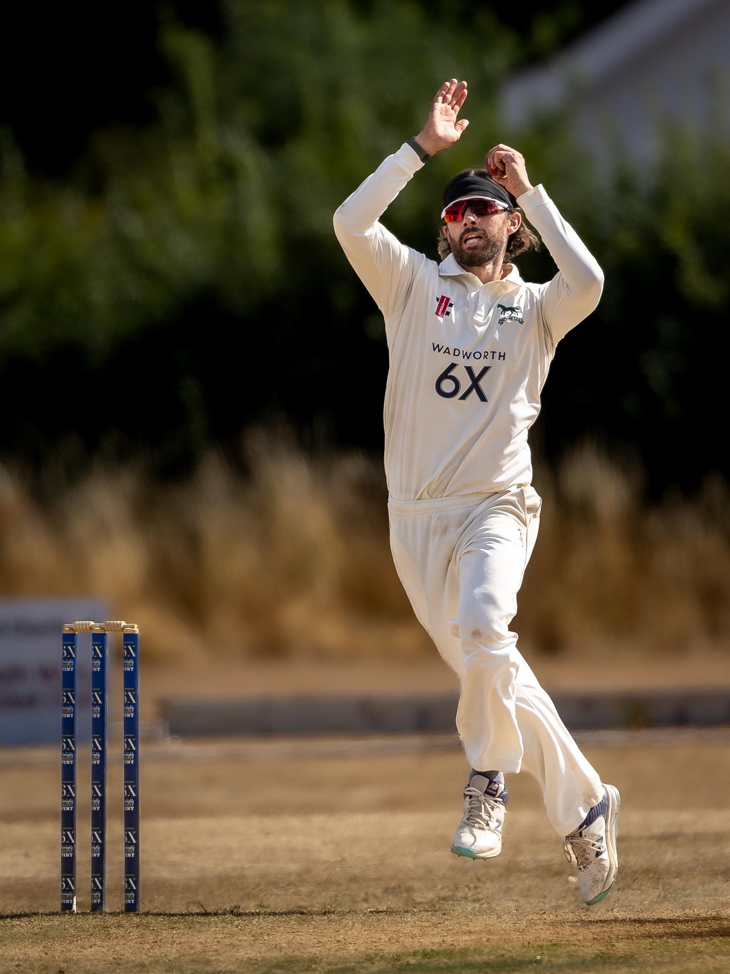 Ed Young bowling for Wiltshire on the first day of the NCCA Cluberly Championship match against Devon held at South Wilts Cricket Club from August 23rd–25th, 2026.