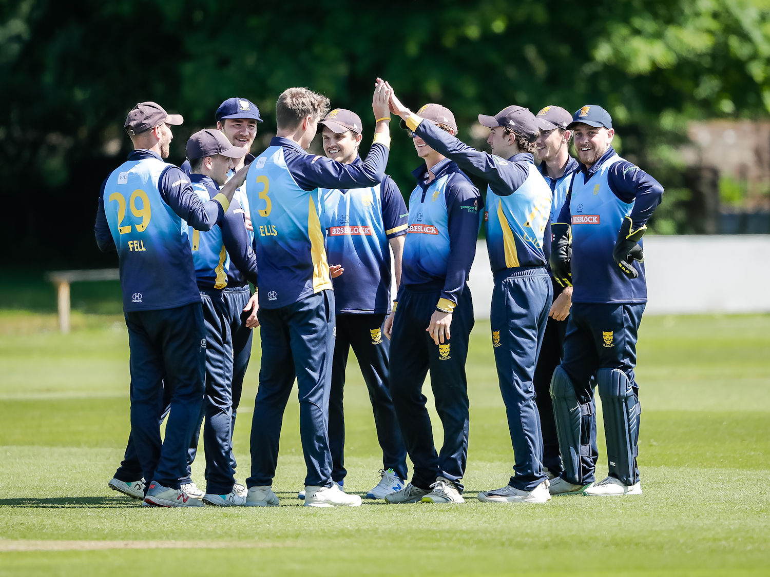 The Shropshire team celebrating after Sam Ellis took the first wicket in the NCCA Trophy match against Suffolk at Shifnall Cricket Club on June 2nd, 2024.