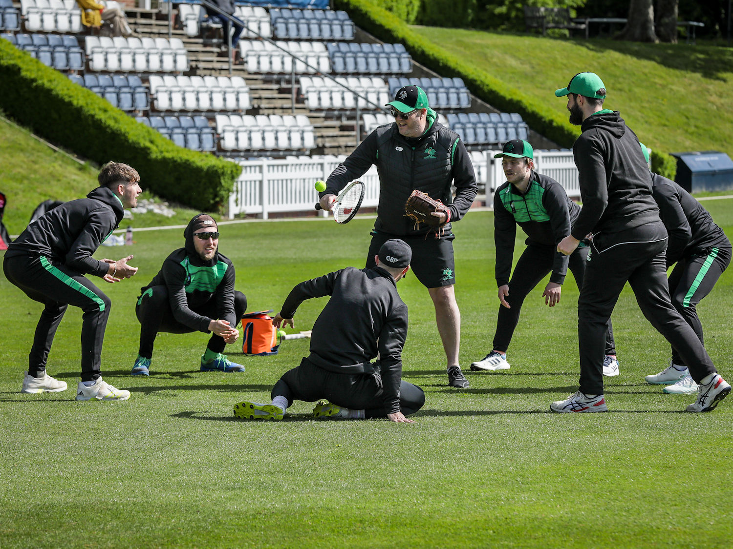 Buckinghamshire players warming up with catching practice ahead of the NCCA Trophy match against Wiltshire at Marlborough College on May 29th, 2023.