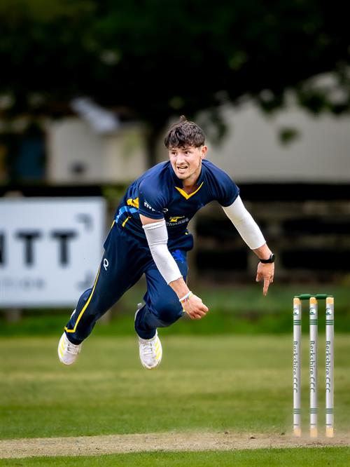 Ben Privett bowling for Devon in the NCCA NV Play Trophy match against Berkshire at Falkland Cricket Club on May 3rd, 2026.