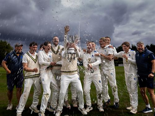 The Devon squad celebrating their win in the NCCA Cluberly Championship Final at West Bromwich Dartmouth Cricket Club on September 9th, 2026.