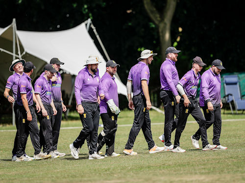 The Cheshire squad walking out for the start of the NCCA Trophy match against Cheshire at Toft Cricket Club on June 25th, 2023.