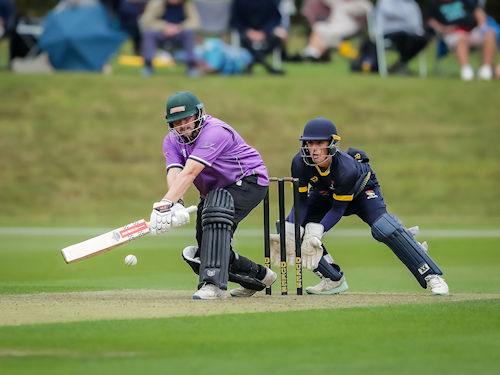 Harry Dearden batting for Cheshire as Charlie Hood keeps wicket for Norfolk in the NCCA Trophy Final at Wormsley Cricket Ground on August 25th, 2024.