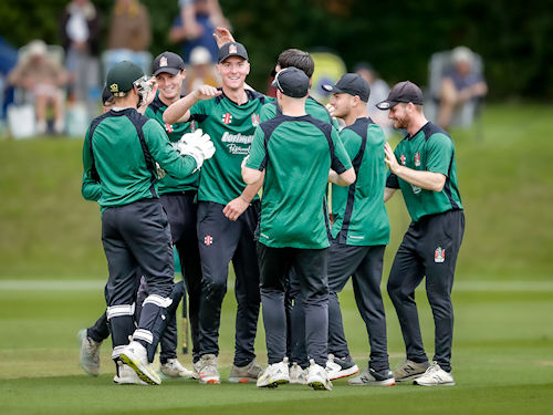 The Cumbria squad celebrate Ben Walkdens run out of Berkshires Archie Carter in the NCCA Trophy final at Wormsley Cricket Ground on August 27th, 2023.