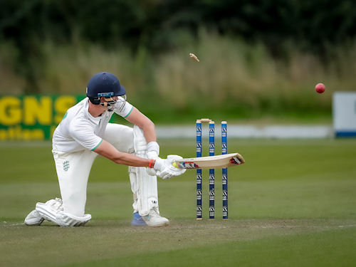 Dorset's Will Tripcony is bowled by Josh Croom on the first day of the Durant Cricket National Counties Championship match against Wiltshire at South Wilts Cricket Club on August 13th, 2023.