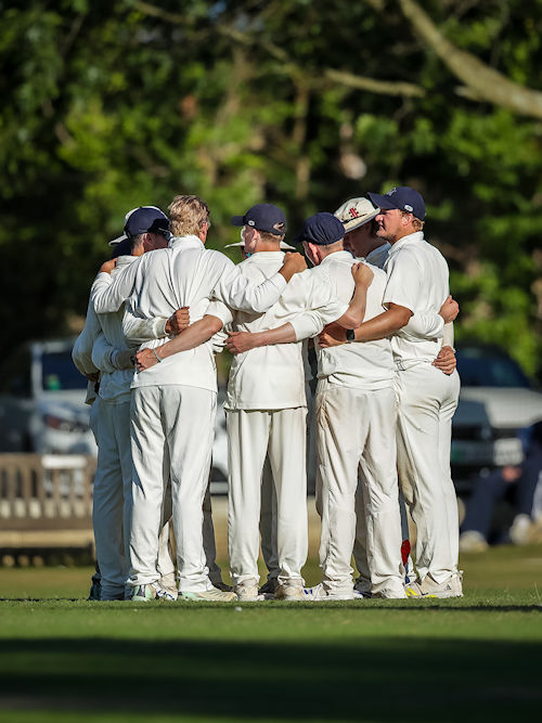 Oxfordshire Team huddle on the second day of the Durant Cricket National Counties Championship match against Berkshire at Falkland Cricket Club on August 12th, 2024.