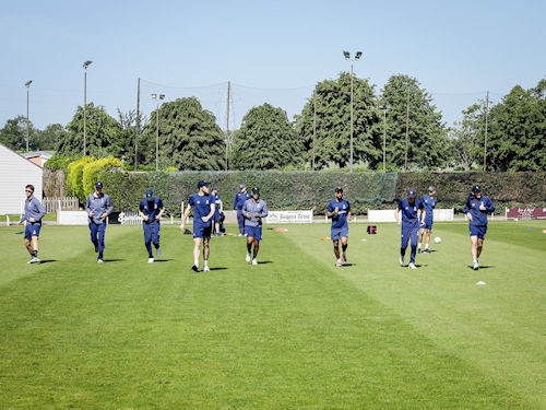 The Suffolk squad warming up for the NCCA Trophy match against Shropshire at Shifnal Cricket Club on June 2nd, 2024.