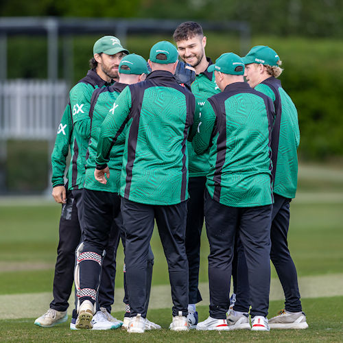 Wiltshire's Jack Campbell centre is congratulated by team mates after taking a wicket in his first over in the NCCA Trophy match against Cheshire at Marlborough College on May 4th, 2025.